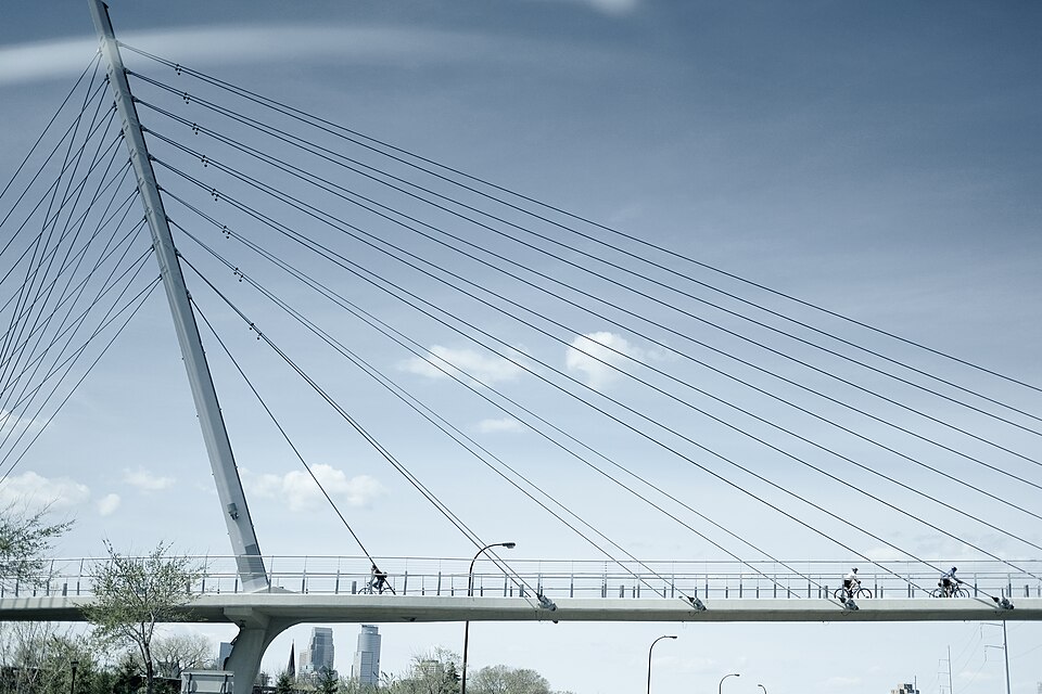 Cyclists ride over the Martin Sabo Bridge, Minneapolis.
Sharon Mollerus, CC BY 2.0 <https://creativecommons.org/licenses/by/2.0>, via Wikimedia Commons